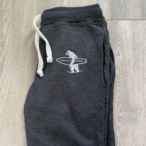 Women’s joggers feat. a surfer bear